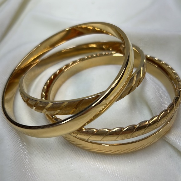 Monet vntg gold tone bracelets. 4 with smooth and etched finishes. Pre owned. - Picture 3 of 5